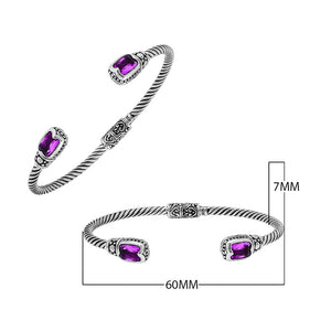Silver twisted cable bangle in 925 sterling silver with Amethyst Quartz ends and Balinese engraving.