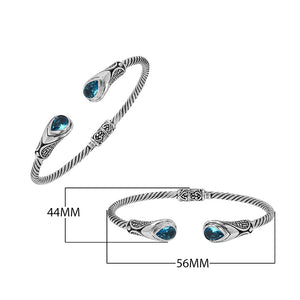 Silver twisted cable bangle in 925 sterling silver with Blue Topaz Quartz and Balinese engraving.