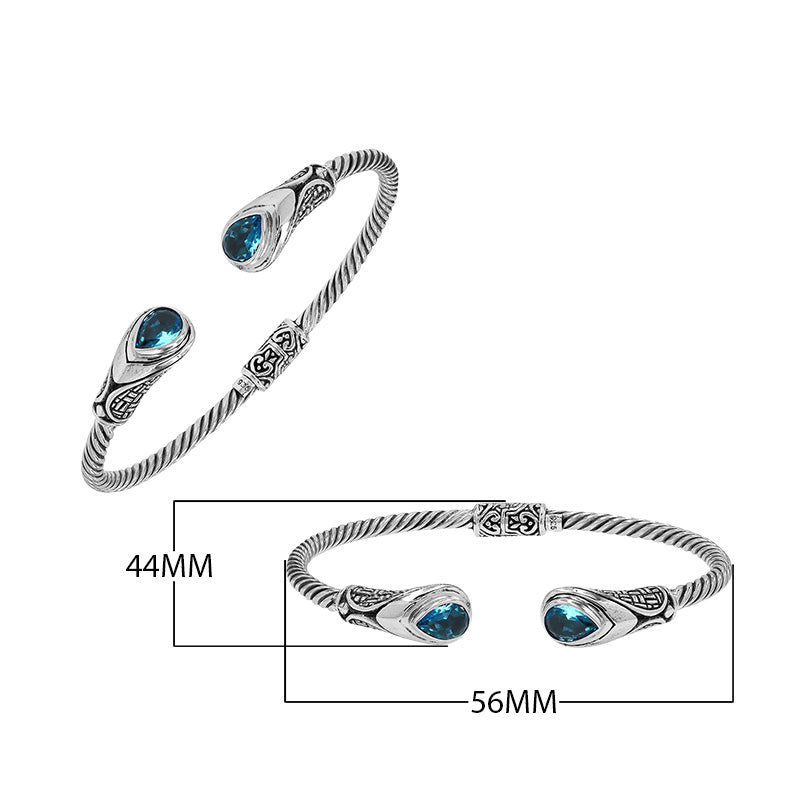 Silver twisted cable bangle in 925 sterling silver with Blue Topaz Quartz and Balinese engraving.
