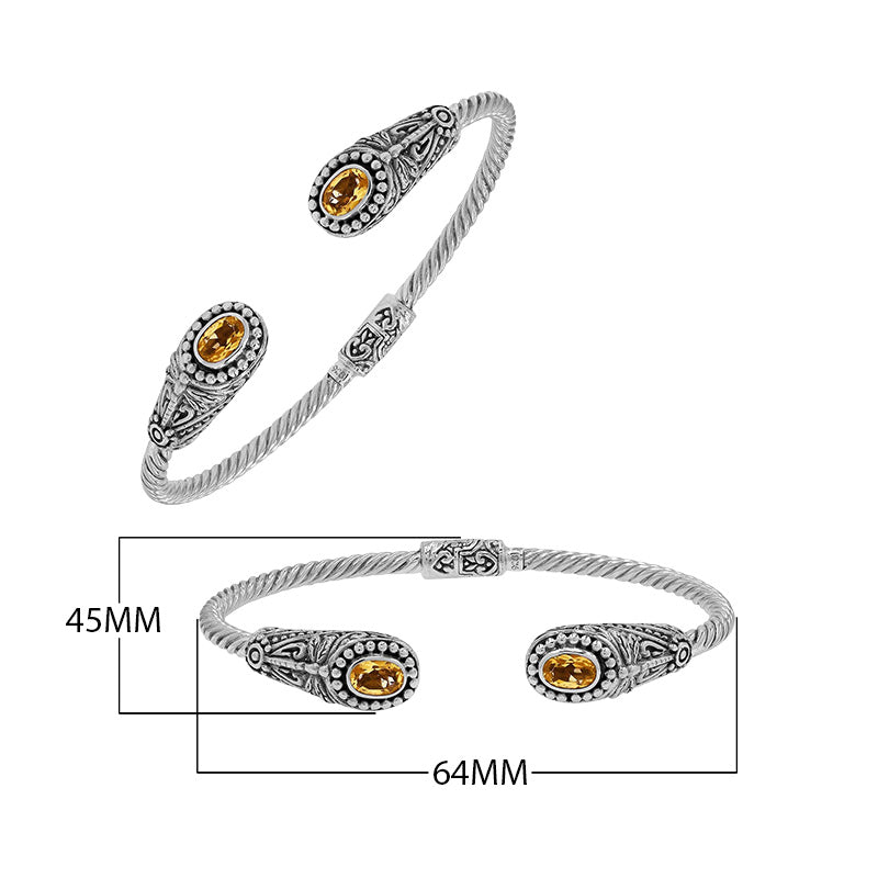 Silver twisted cable bangle in 925 sterling silver with Citrine Quartz ends and Balinese engraving.
