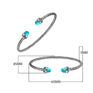 Sterling Silver Twisted Cable Bangle With Turquoise Shell and Oxidized Tribal Detailing For Wholesale Buyers.
