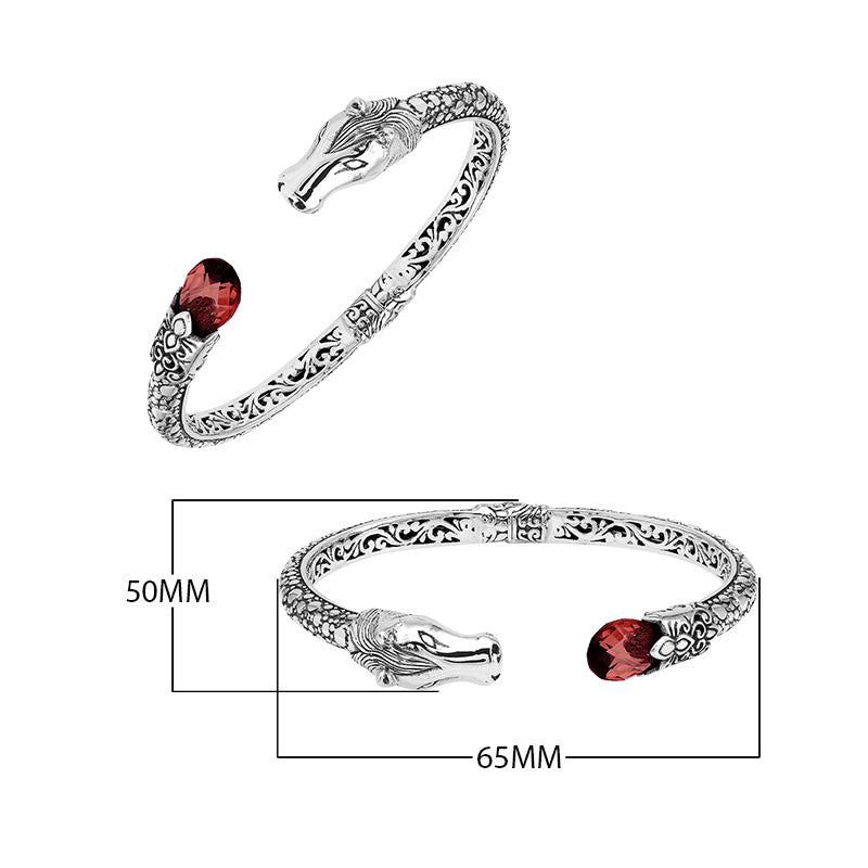 Sterling Silver Dragon Head Bangle with Garnet Quartz handcrafted in Bali, featuring intricate filigree and oxidized silver detailing.