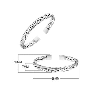 A wholesale sterling silver small woven bangle featuring polished Balinese textures, smooth finishing, and a secure hinge lock perfect for lightweight premium jewelry collections.