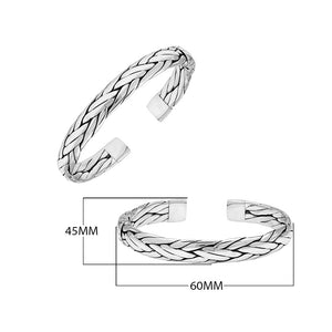 A wholesale sterling silver large woven bangle featuring bold Balinese textures, polished detailing, and a secure hinge lock, ideal for premium bulk jewelry purchasing.