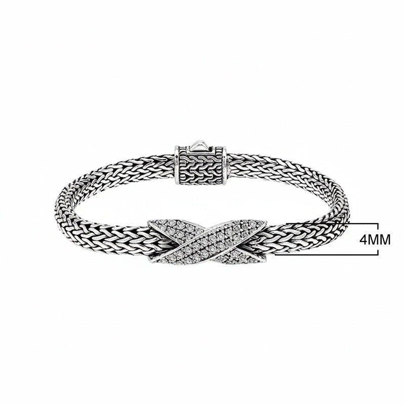 Sterling silver woven chain bracelet with White Cubic Zirconia crossover accent handcrafted in Bali.