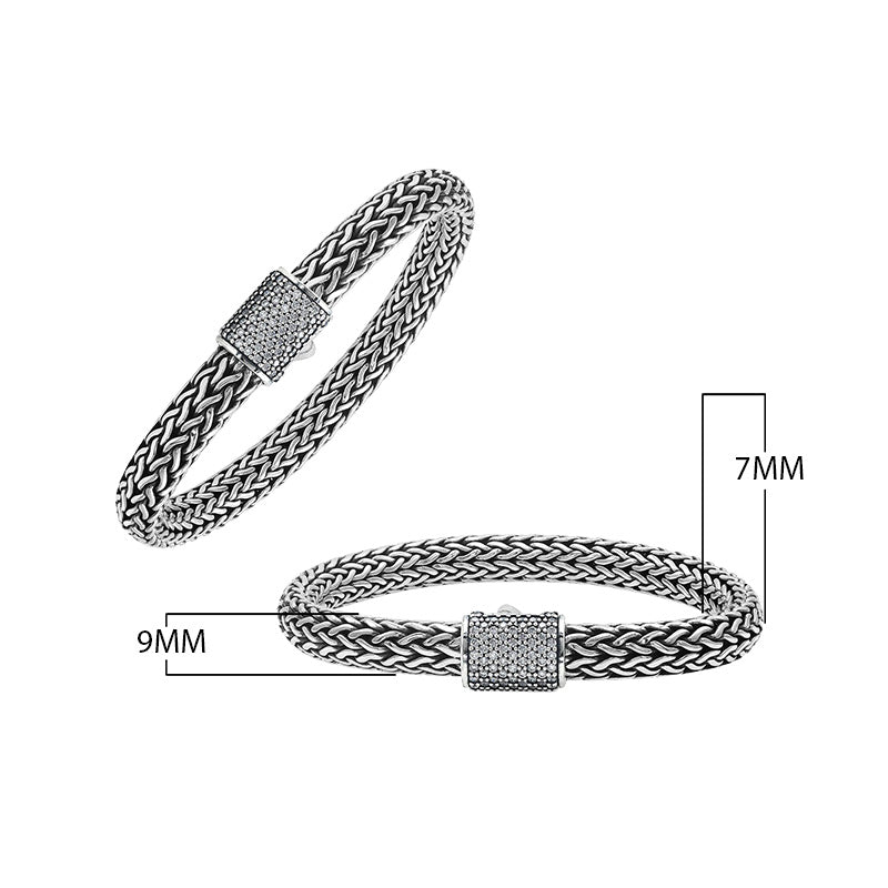 A wholesale sterling silver broad woven bracelet featuring a CVD Diamond-studded push clasp, polished and oxidized detailing, and bold craftsmanship designed for premium bulk jewelry collections.