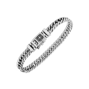 Sterling Silver chain bracelet featuring a polished surface and a secure push clasp decorated with tribal pattern detailing, crafted for durable everyday wear and elegant appeal.