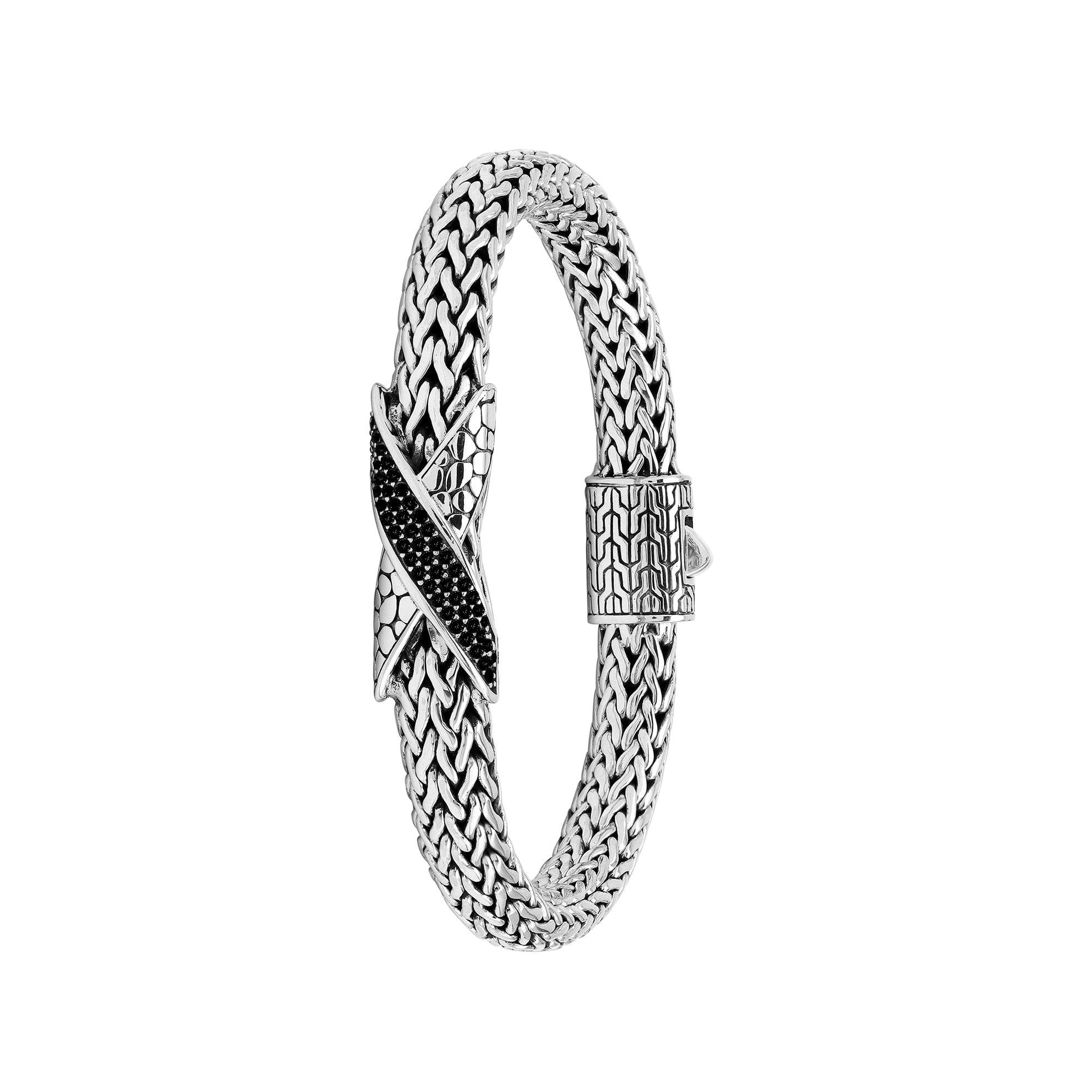 Sterling Silver woven bracelet featuring a polished push clasp and a Cubic Zirconia accented centerpiece, crafted with intricate detailing for durable and visually refined wholesale presentation.