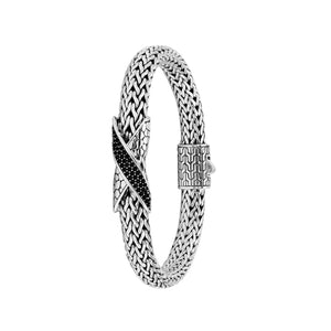 Sterling Silver woven bracelet featuring a polished push clasp and a Cubic Zirconia accented centerpiece, crafted with intricate detailing for durable and visually refined wholesale presentation.