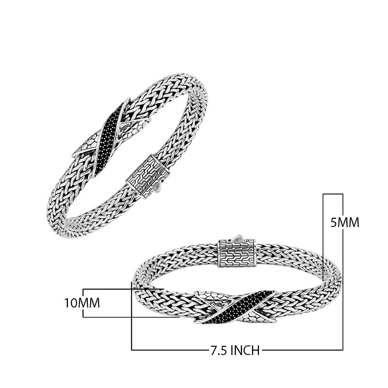 Sterling Silver woven bracelet featuring a polished push clasp and a Cubic Zirconia accented centerpiece, crafted with intricate detailing for durable and visually refined wholesale presentation.