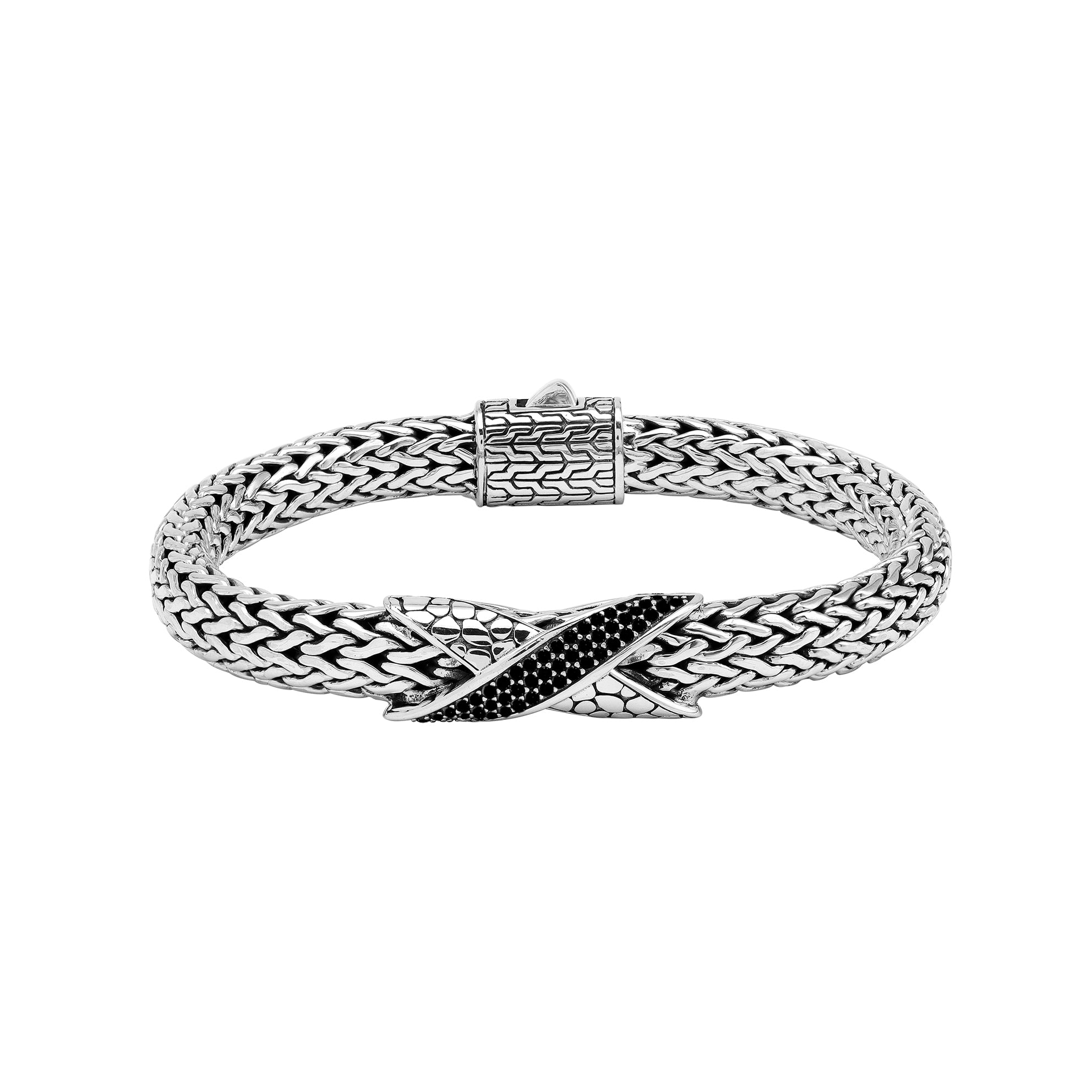 Sterling Silver woven bracelet featuring a polished push clasp and a Cubic Zirconia accented centerpiece, crafted with intricate detailing for durable and visually refined wholesale presentation.