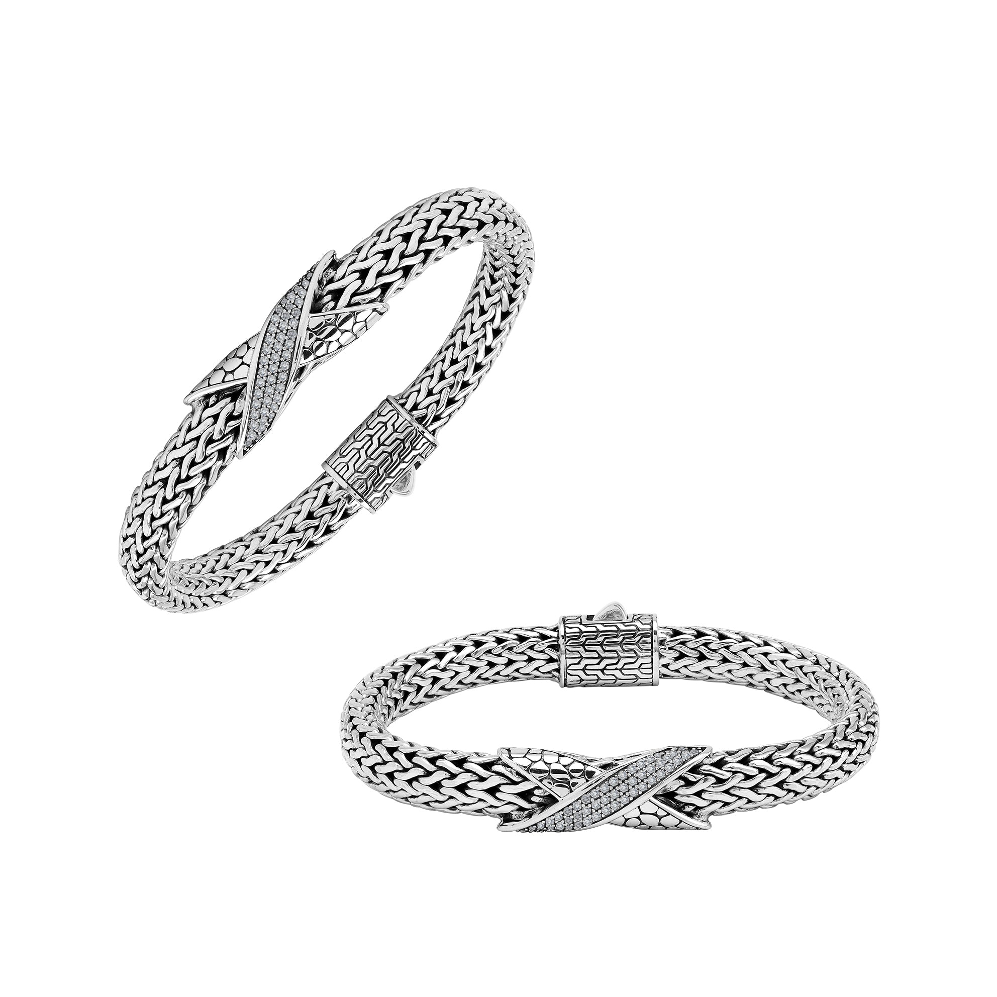 Sterling Silver woven bracelet featuring a polished push clasp and a sparkling Cubic Zirconia crisscross centerpiece, designed with durable construction and fine detailing for professional wholesale presentation.