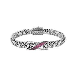 Sterling Silver woven chain bracelet featuring a polished push clasp and a Ruby Quartz crisscross accent centerpiece crafted with detailed metalwork for an elegant and durable wholesale presentation.