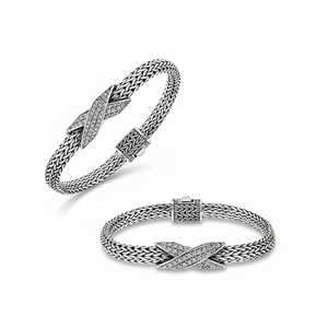 Sterling silver woven chain bracelet with White Cubic Zirconia crossover accent handcrafted in Bali.