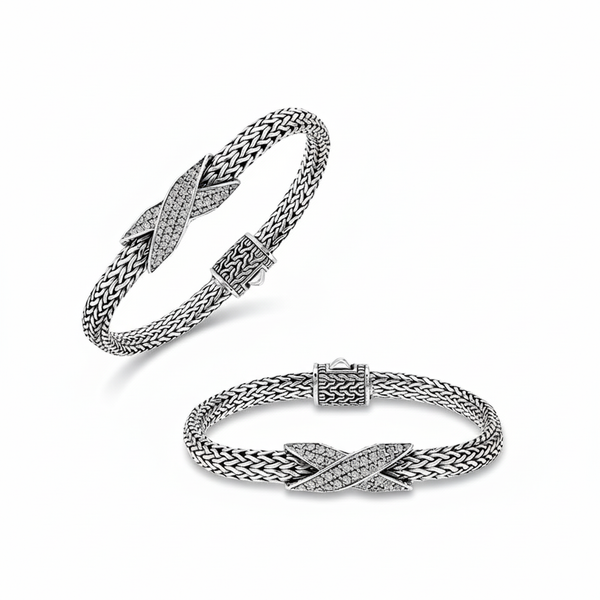 Sterling silver woven chain bracelet with White Cubic Zirconia crossover accent handcrafted in Bali.