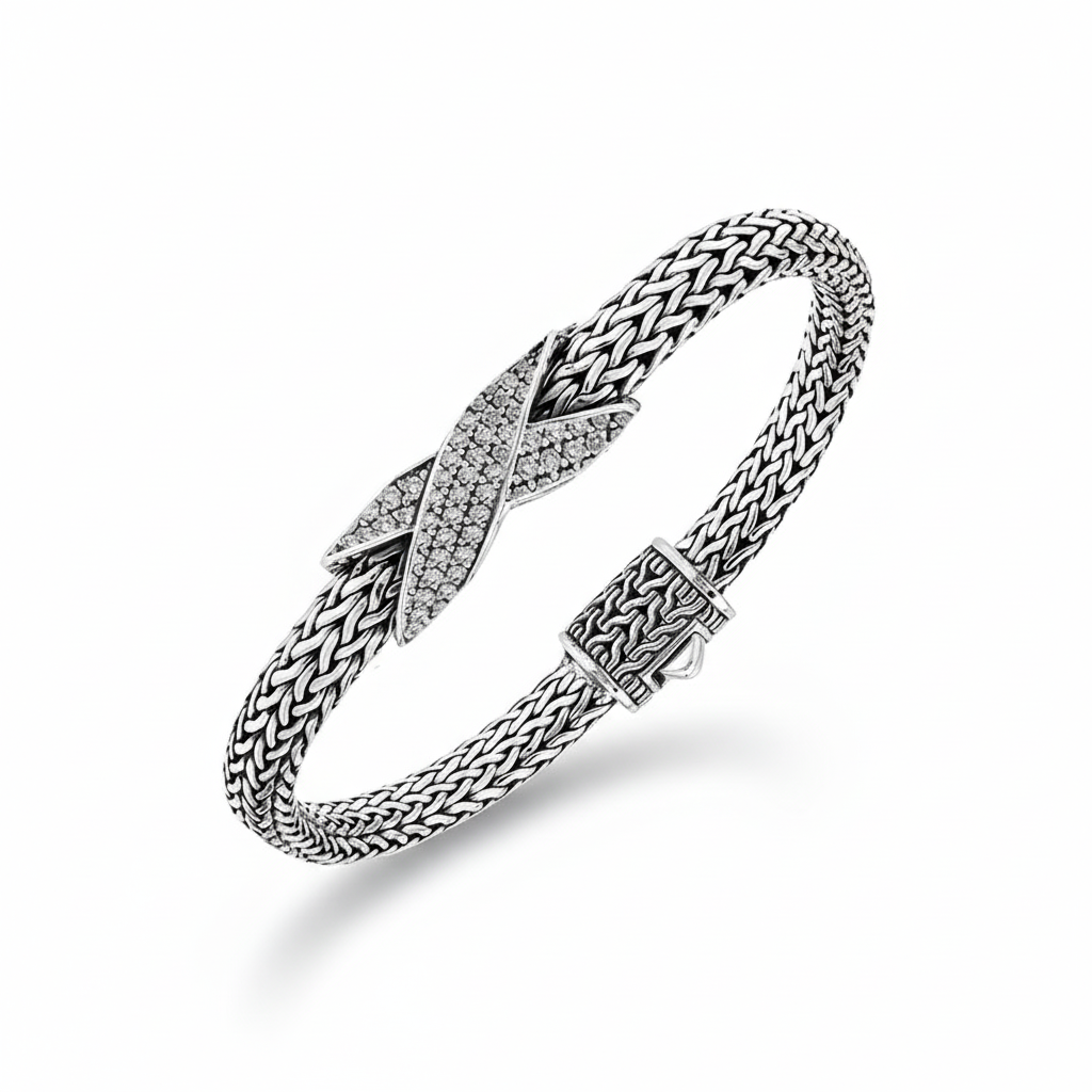 Sterling silver woven chain bracelet with White Cubic Zirconia crossover accent handcrafted in Bali.