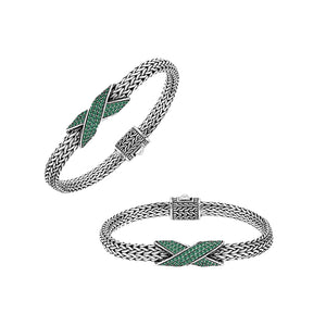 Sterling silver woven chain bracelet with purple Emerald Quartz crossover accent handcrafted in Bali.