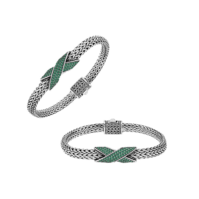 Sterling silver woven chain bracelet with purple Emerald Quartz crossover accent handcrafted in Bali.