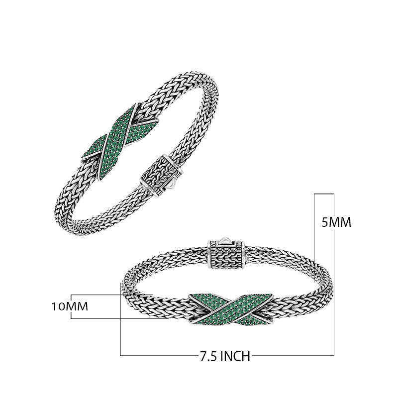 Sterling silver woven chain bracelet with purple Emerald Quartz crossover accent handcrafted in Bali.