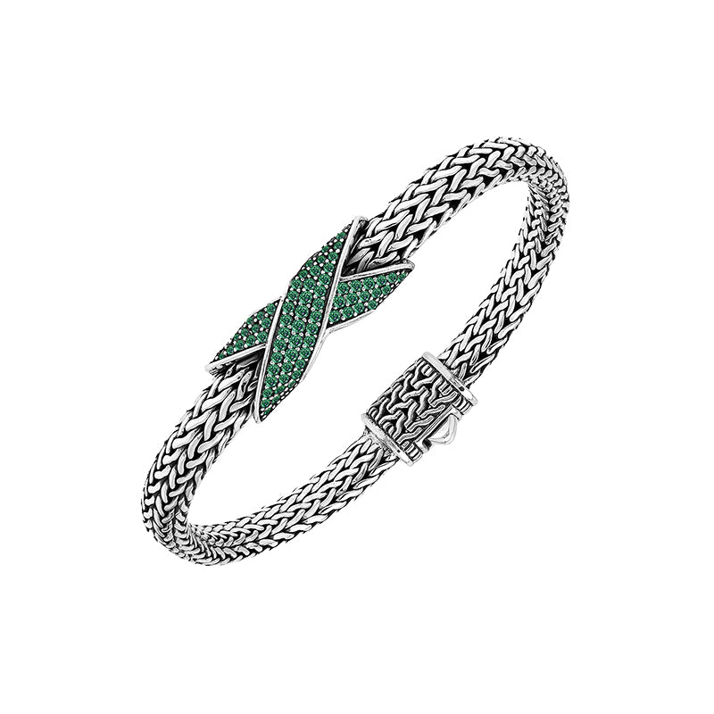 Sterling silver woven chain bracelet with purple Emerald Quartz crossover accent handcrafted in Bali.
