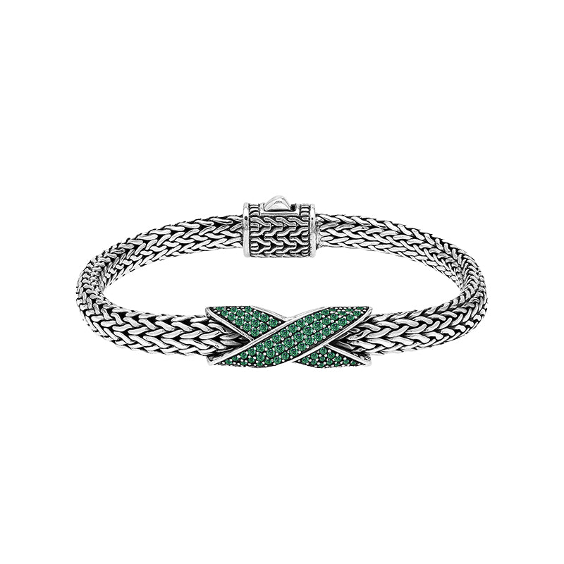 Sterling silver woven chain bracelet with purple Emerald Quartz crossover accent handcrafted in Bali.