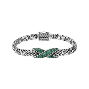 Sterling silver woven chain bracelet with purple Emerald Quartz crossover accent handcrafted in Bali.
