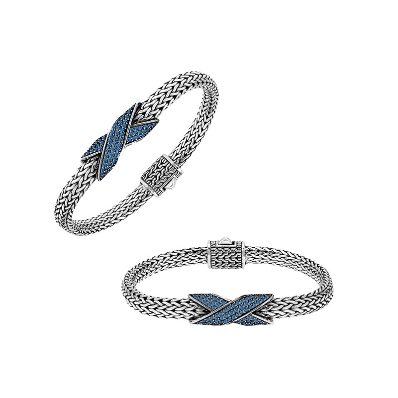 Sterling silver woven chain bracelet with purple Sapphire quartz crossover accent handcrafted in Bali.