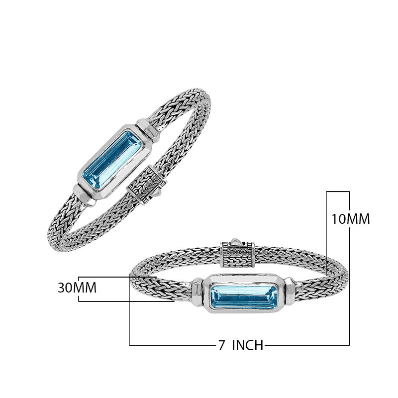 Sterling Silver woven bracelet featuring a polished push clasp and a rectangular Blue Topaz Quartz centerpiece, crafted with detailed metalwork for an elegant and durable wholesale-ready presentation.
