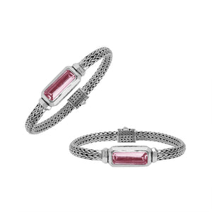 Wholesale sterling silver bracelet featuring a rectangular pink quartz baguette with a handwoven silver chain handcrafted in Bali.