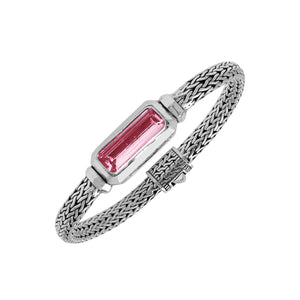 Wholesale sterling silver bracelet featuring a rectangular pink quartz baguette with a handwoven silver chain handcrafted in Bali.