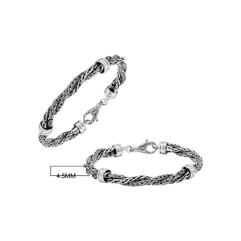 Sterling Silver bracelet featuring a twisted woven chain design with polished metal connectors and a secure lobster clasp, crafted for durable and elegant wholesale presentation.