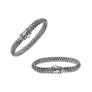 Sterling Silver woven bracelet featuring a patterned push lock and a polished high-gloss finish, crafted for durability and refined wholesale presentation.