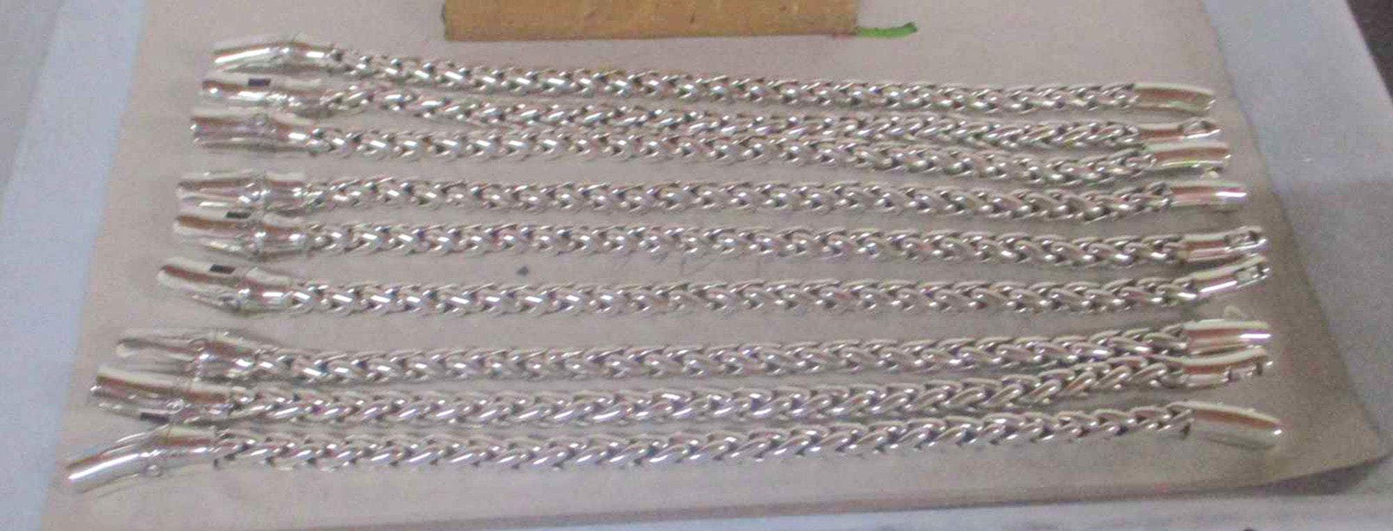 Sterling silver chain bracelet with push clasp and polished interlinked design