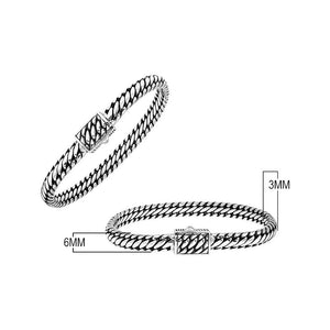 Sterling silver braided wheat chain bracelet with interwoven links, rectangular box clasp, polished highlights, and oxidized detailing