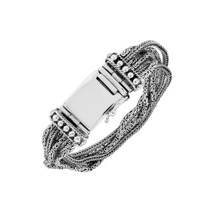 Sterling silver multi-chain panel bracelet with polished finish and handcrafted silver detailing.