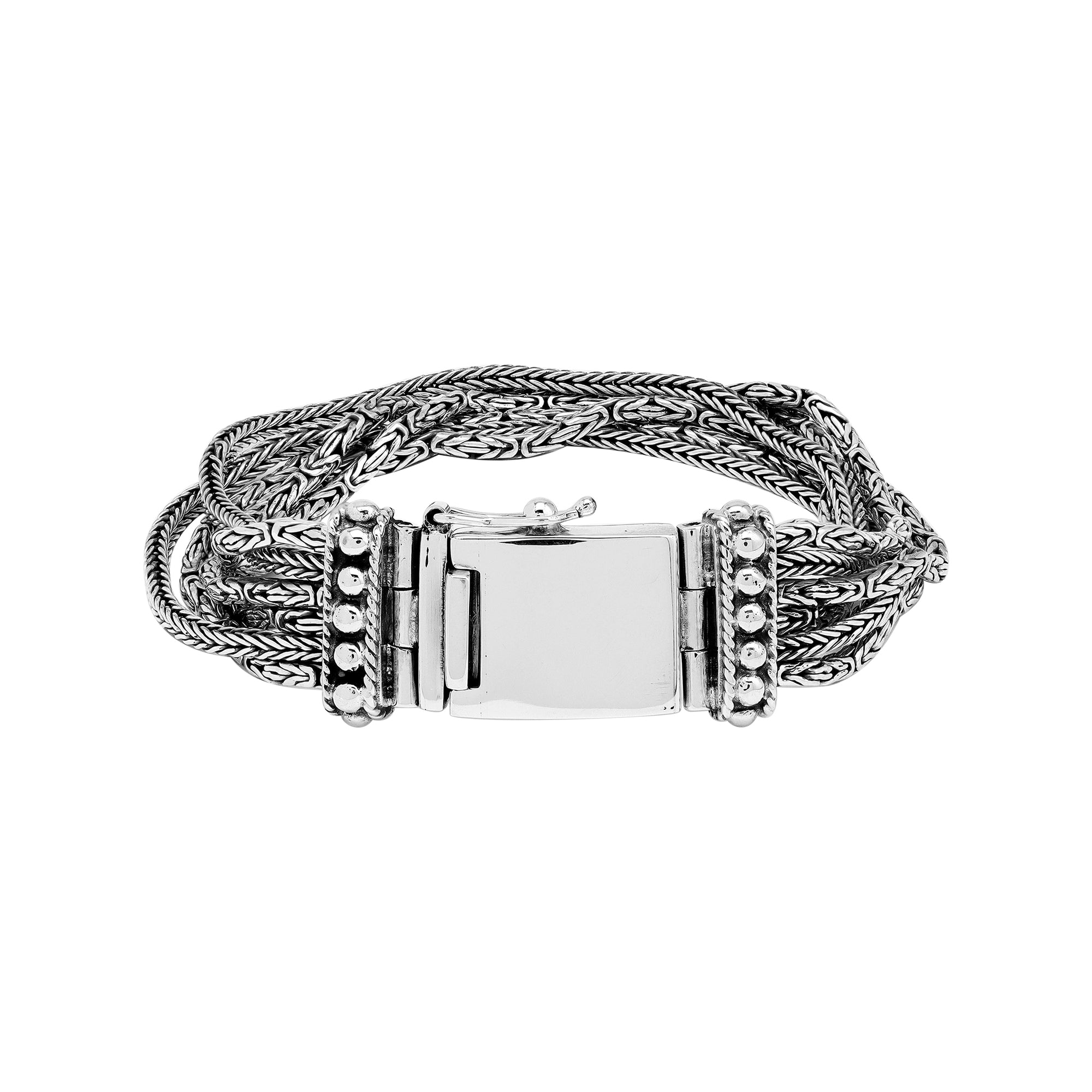 Sterling silver multi-chain panel bracelet with polished finish and handcrafted silver detailing.