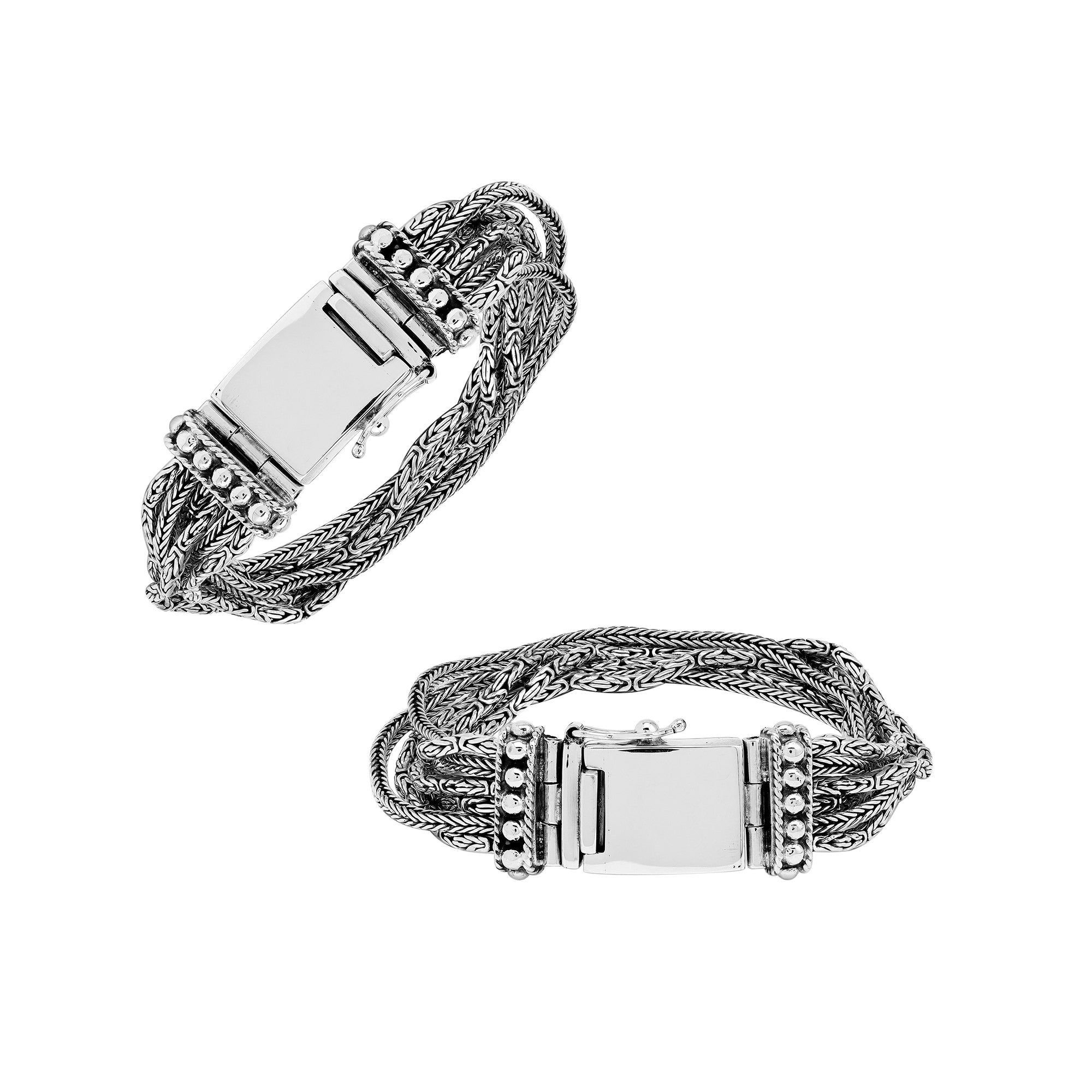 Sterling silver multi-chain panel bracelet with polished finish and handcrafted silver detailing.