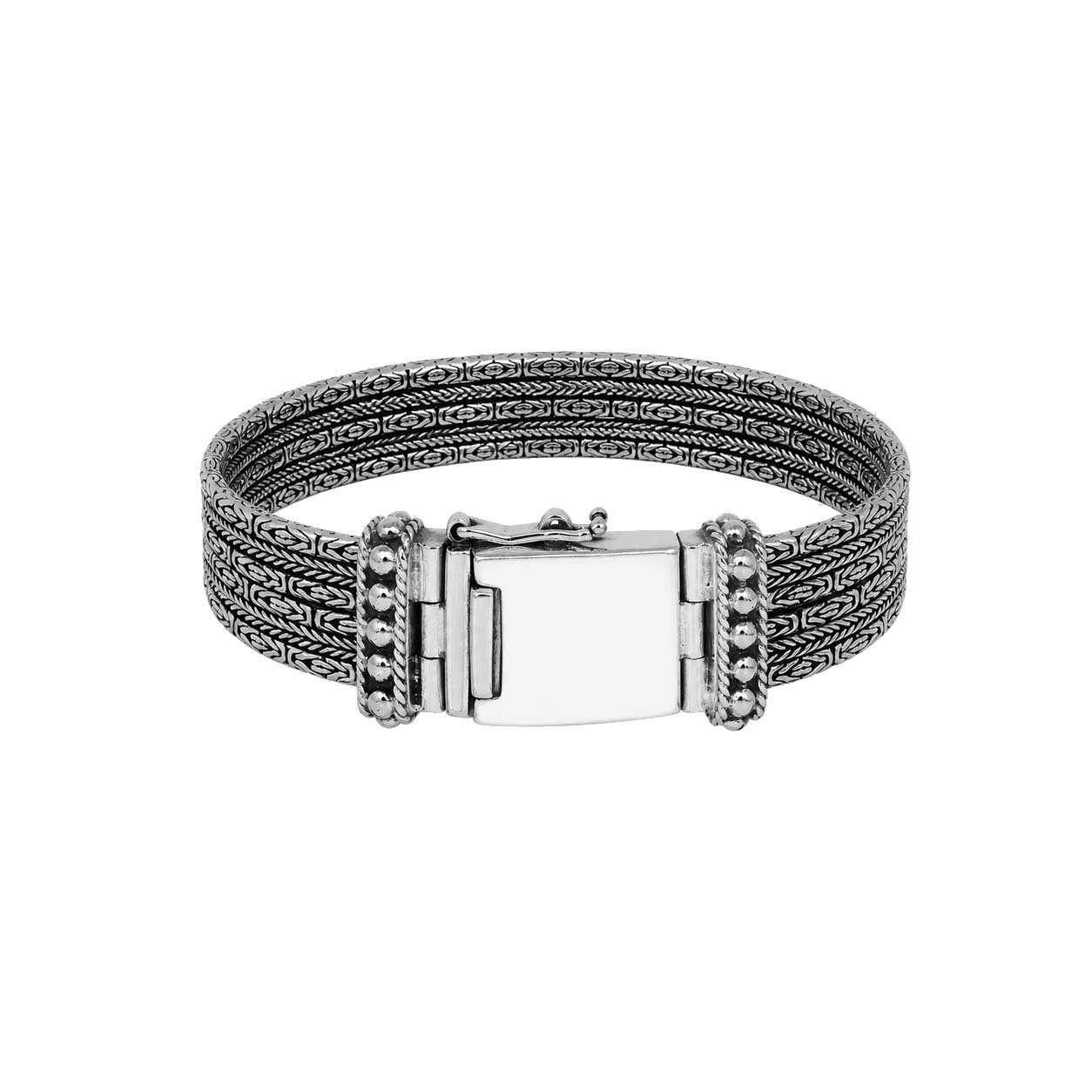 Sterling silver multi-chain panel bracelet with polished finish and handcrafted silver detailing.