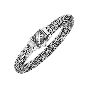 Sterling silver multi-strand braided chain bracelet featuring intricate woven textures, oxidized detailing, polished accents, and an engraved rectangular push clasp.