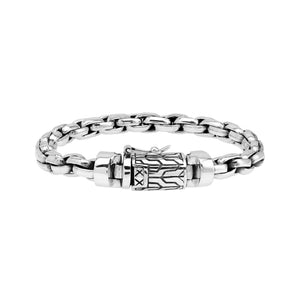 Sterling silver round braided link chain bracelet featuring substantial interwoven links, polished surfaces, oxidized accents, and an engraved decorative box clasp.
