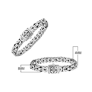 Sterling silver sculpted Byzantine link bracelet with connector bands, decorative push clasp, polished surfaces, and oxidized detailing