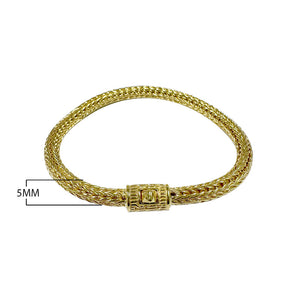 18K gold rounded woven chain bracelet with push clasp lock and polished handcrafted finish.