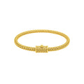 18K gold rounded woven chain bracelet with push clasp lock and polished handcrafted finish.