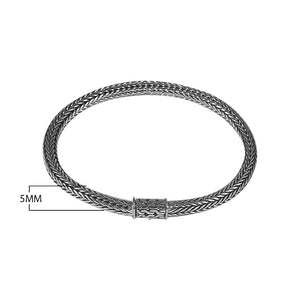 Sterling silver woven bracelet with polished surface and secure push clasp, featuring a classic rounded chain pattern for wholesale supply.