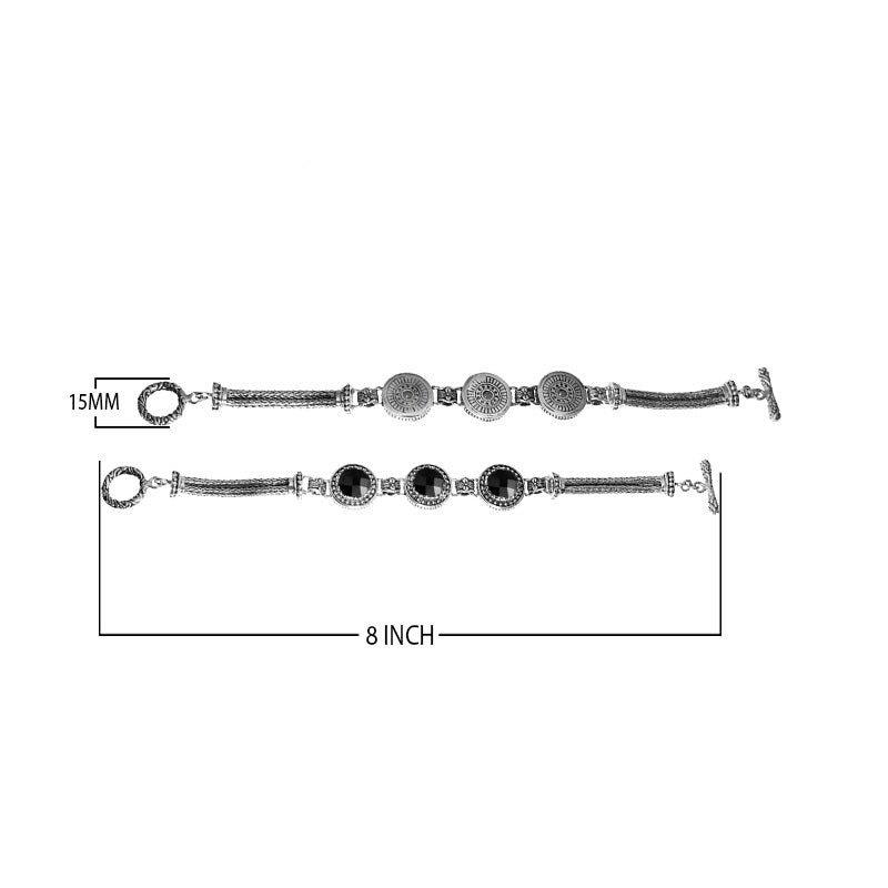 Sterling silver bracelet with Black Onyx, detailed circular motifs, multi-strand braided chains, and a decorative toggle clasp.