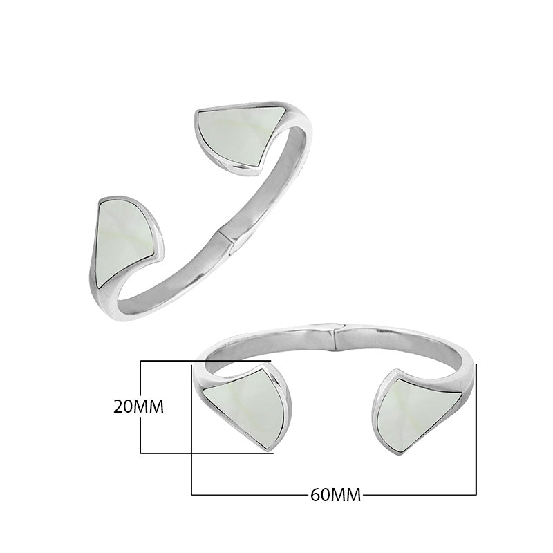 Wholesale sterling silver cuff featuring smooth Mother Of Pearl inlays placed on sculpted open ends with a polished finish and secure hinge lock for catalog display.