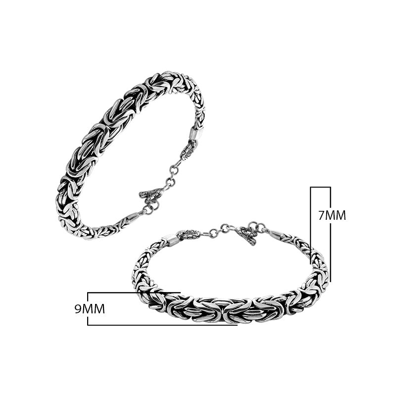 Wholesale sterling silver bracelet featuring a bold 7MM x 9MM braided chain with polished and oxidized details and a secure toggle lock for catalog-ready presentation.