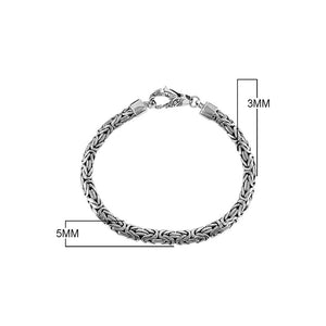 Wholesale sterling silver bracelet featuring a 3MM x 5MM Balinese woven chain with polished and oxidized detailing, finished with a secure lobster lock for catalog presentation.