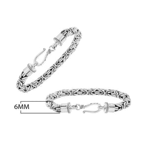 Wholesale sterling silver bracelet with Balinese woven wheat-link design and decorative lobster clasp handcrafted in Bali.