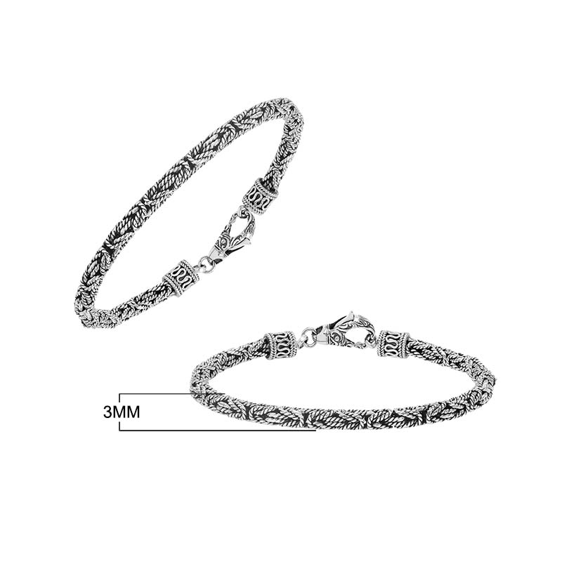 Sterling silver braided wheat chain bracelet with oxidized finish and ornate hook clasp handcrafted in Bali.